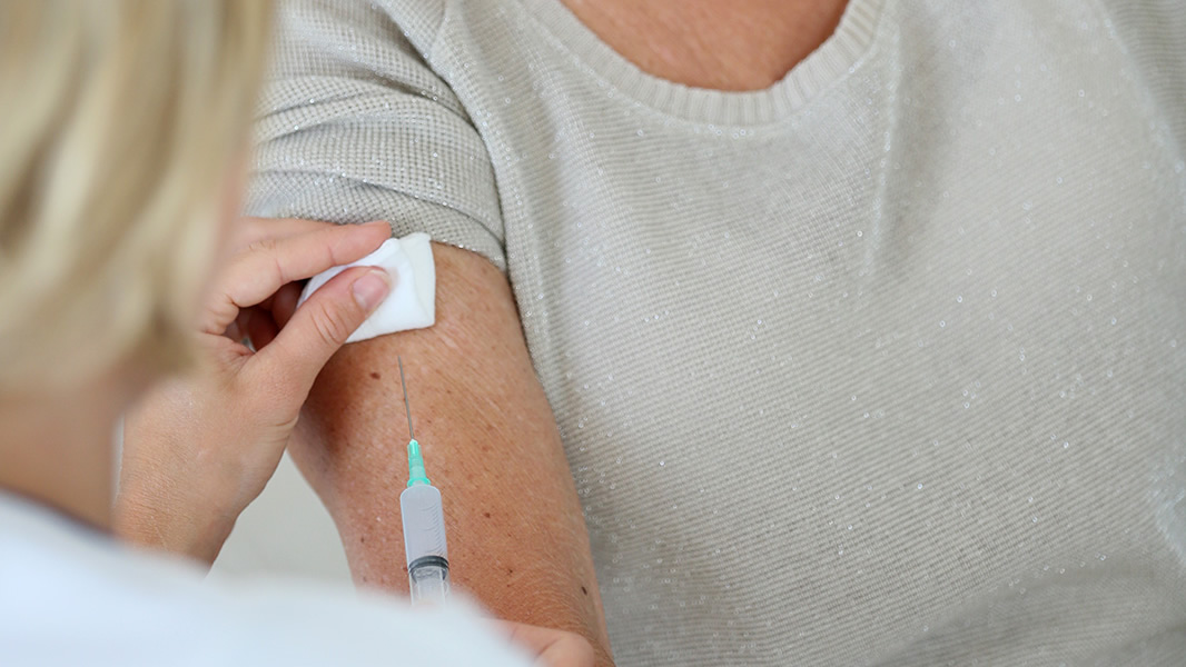 Woman receiving an injection